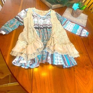 Boho blouse and vest.